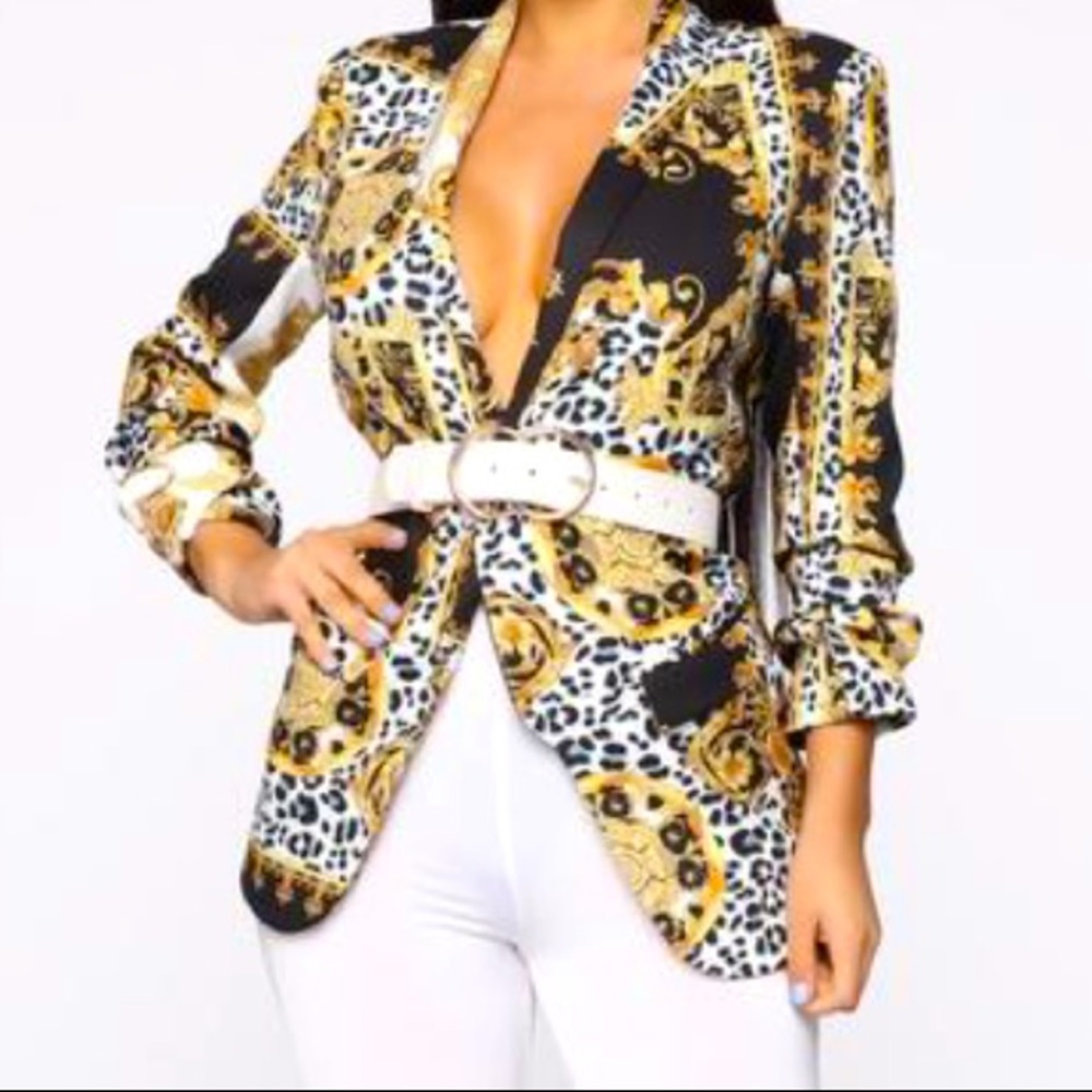 Luxe print blazer with 3/4 ruched sleeves.